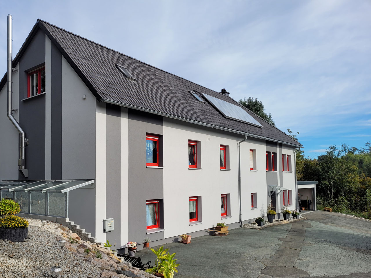 Beispielarbeit von Maler Scharschmidt Fassade - Lehmputz - natürliche Wandbeschichtungen - veröffentlicht auf Maler.org